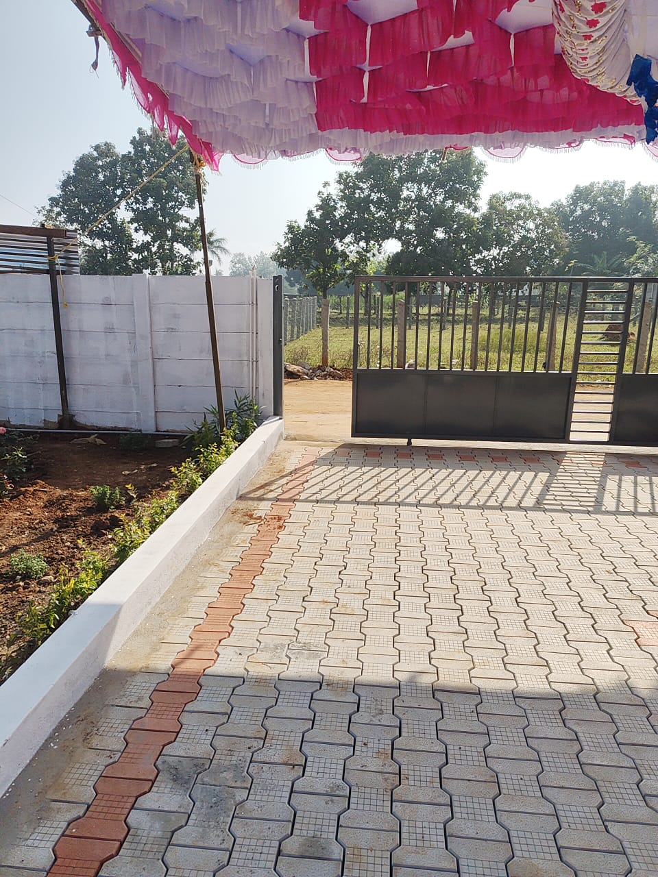Paved Driveway with Secure Entrance Gate